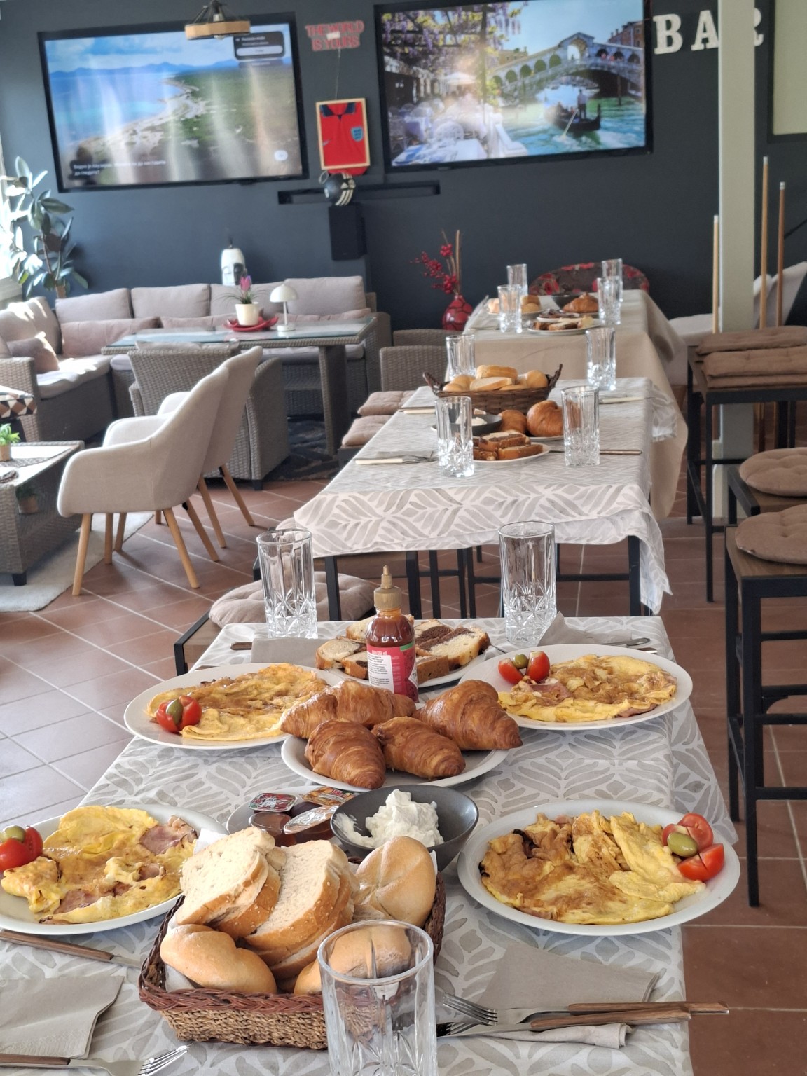 Breakfast with omelettes, croissants and bread at Tebra